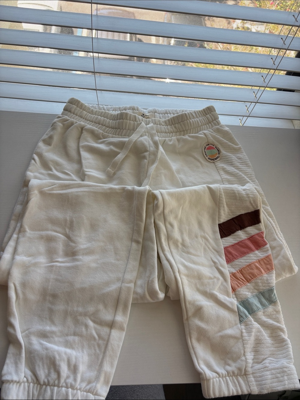 Rip Curl women’s  Cream Joggers with Multi-Stripe Leg Accent